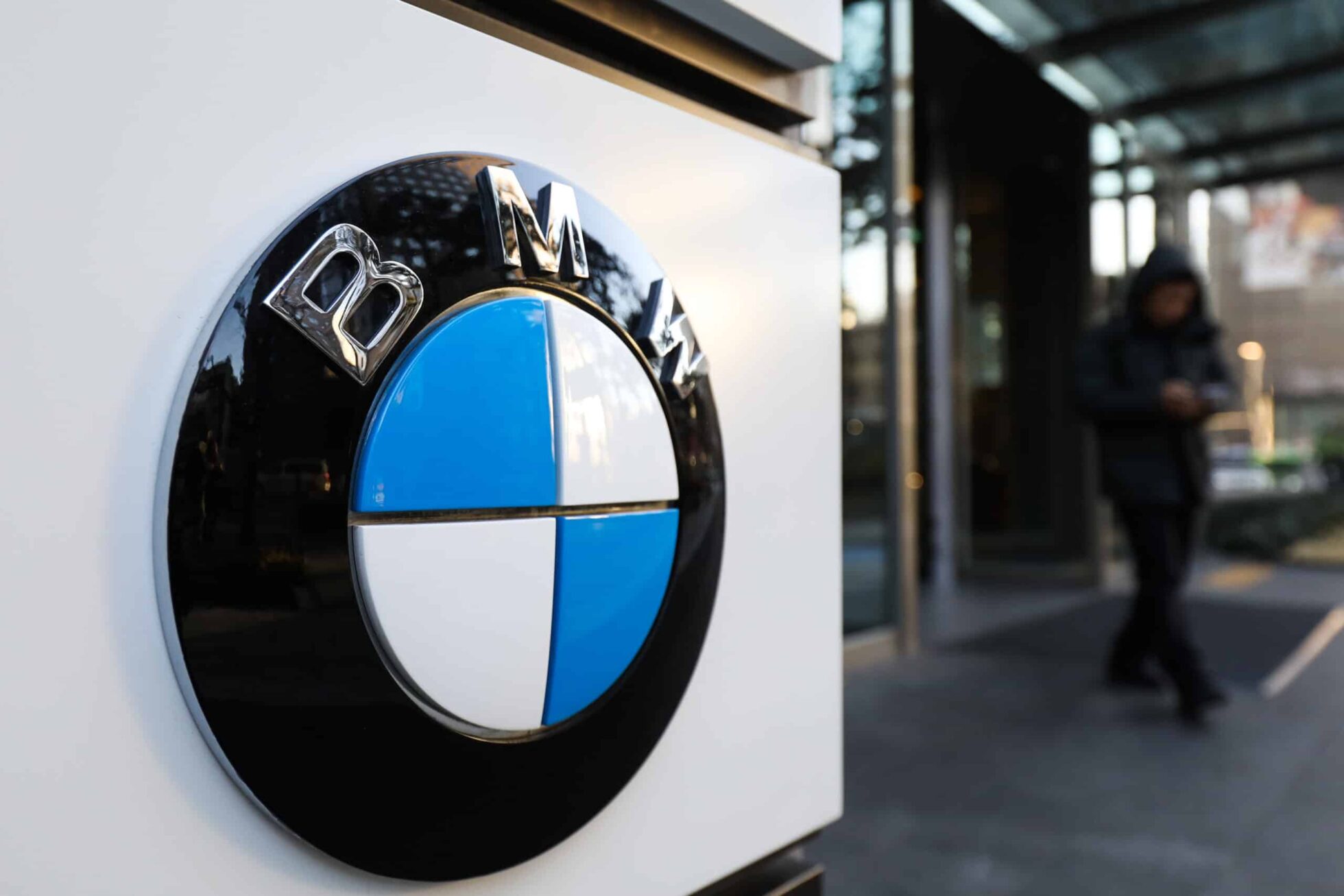 The BMW AG logo is displayed outside a building housing the company's offices in Seoul, South Korea, on Monday, Dec. 24, 2018. BMW is facing a criminal probe in South Korea after investigators concluded the company concealed fire hazards and delayed recalls. Photographer: SeongJoon Cho/Bloomberg