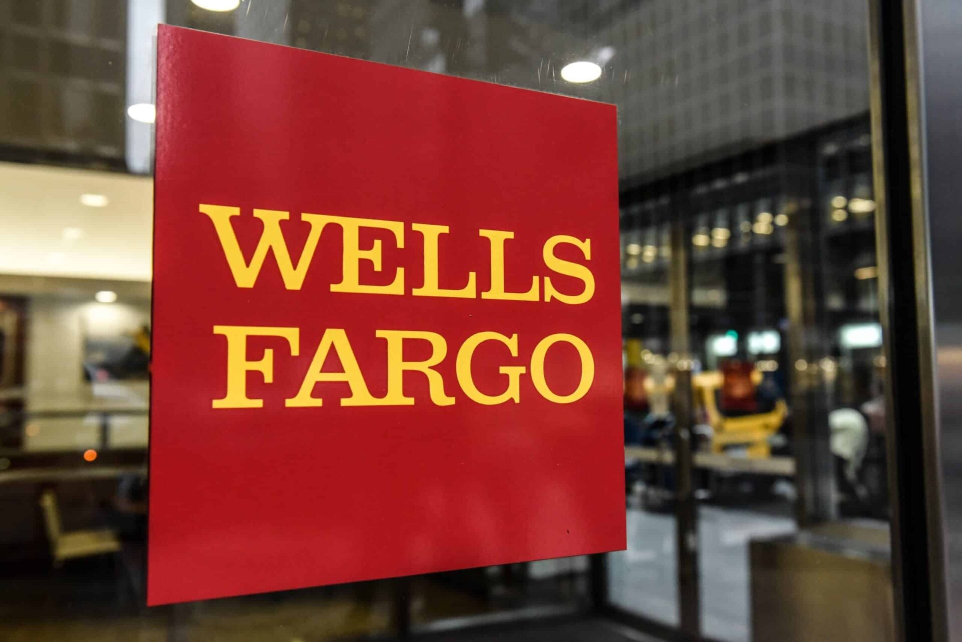 Signage outside a Wells Fargo bank branch in New York, US, on Thursday, Jan. 12, 2023. Wells Fargo & Co. is scheduled to report earnings figures on January 13. Photographer: Stephanie Keith/Bloomberg